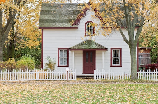 front door of house picket fencing