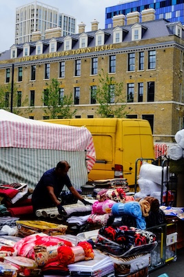 market trader in front of tower hamlets town hall